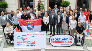 Abschied der Olympioniken: Rhein wirbt für Spiele in Deutschland