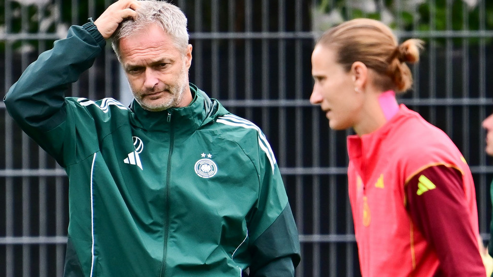 Bundestrainer Christian Wück und Torhüterin Ann-Katrin Berger