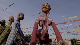 Trotz Treibstoffkrise und Konflikt: Malis Riesenpuppen bringen Leben und Hoffnung nach Bamako